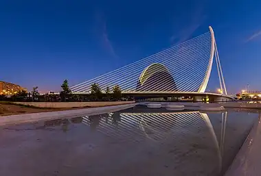 Image 1Assut de l'Or BridgePhotograph: Diego DelsoThe Assut de l'Or Bridge is a white single-pylon cable-stayed bridge in the City of Arts and Sciences,  Valencia, Spain. Completed in 2008, it was designed by Valencian architect and civil engineer Santiago Calatrava as a variant of his cantilever spar cable-stayed bridge in Seville.More selected pictures