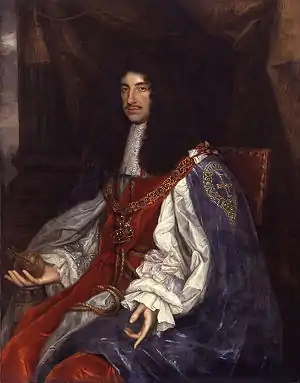 Charles is of thin build and has chest-length curly black hair