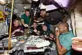 The crew having dinner in Node 1